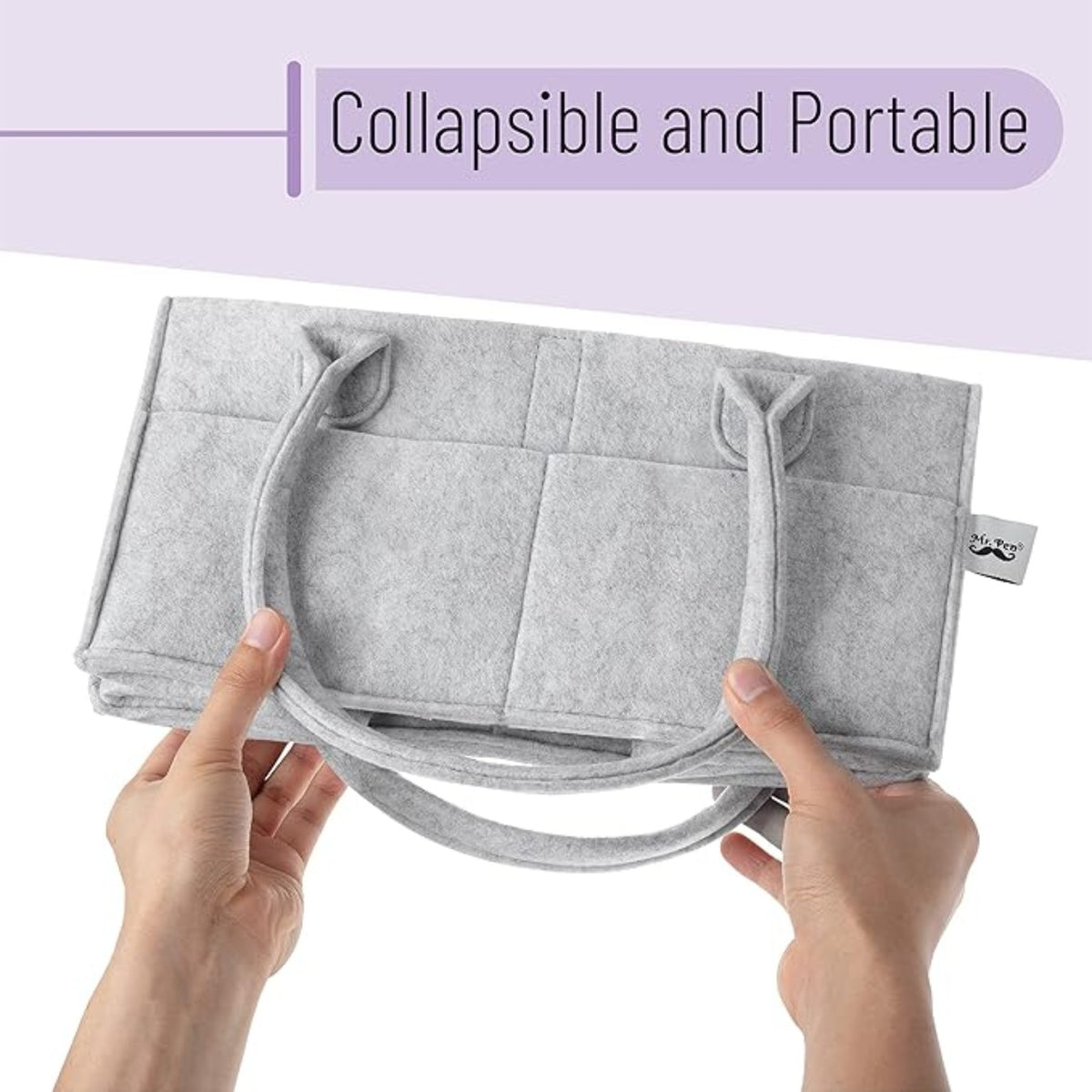 Supplier reference photo of a grey felt caddy folded flat and held by an adult. Third-party label visible; exact LEONO sample pending.